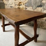 Small rustic table made of solid wood.