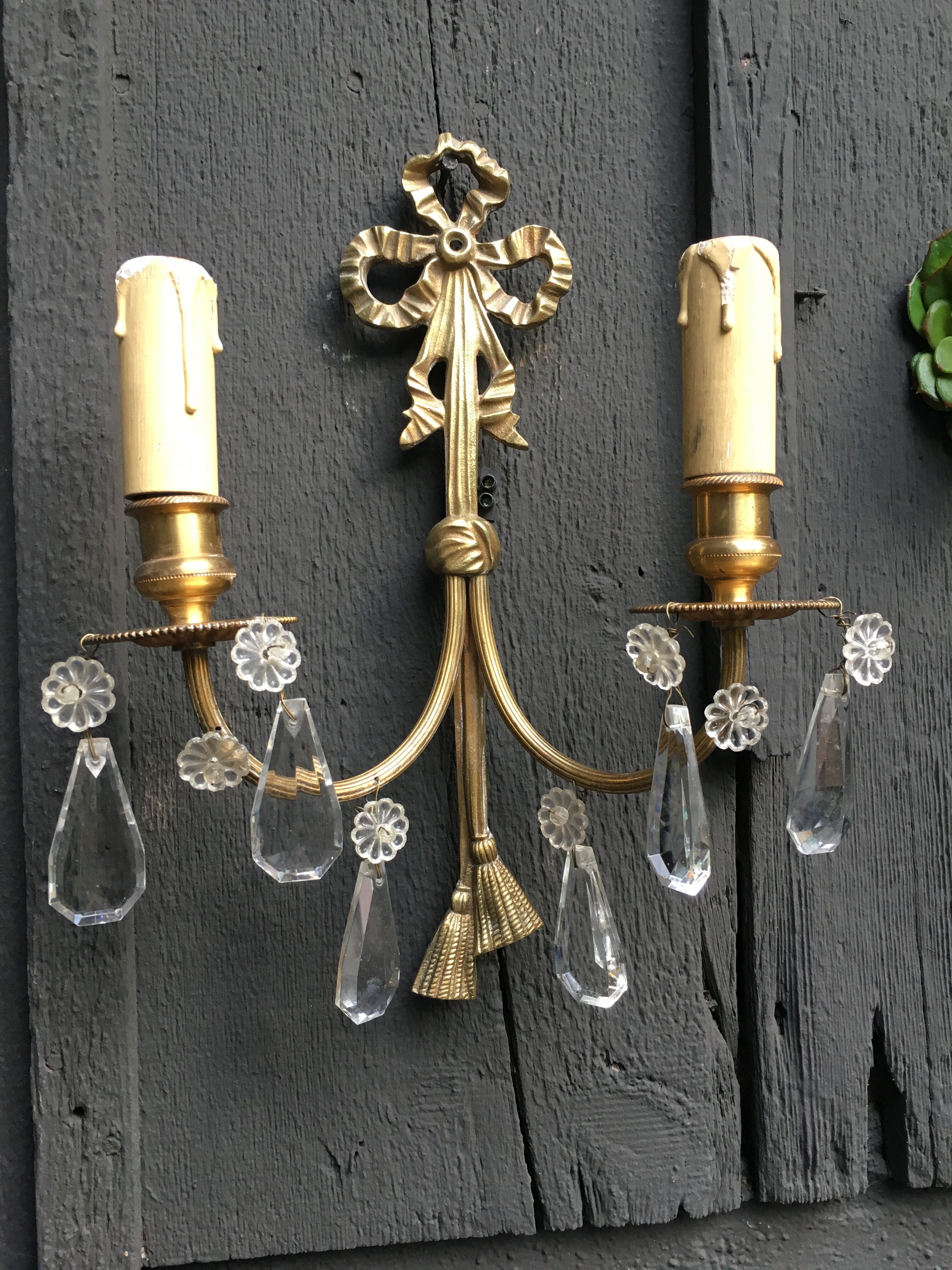 Paire d'appliques en bronze et pampilles