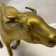 Brass buffalo figure