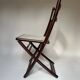 Set de quatre chaises pliantes en bois et cannage