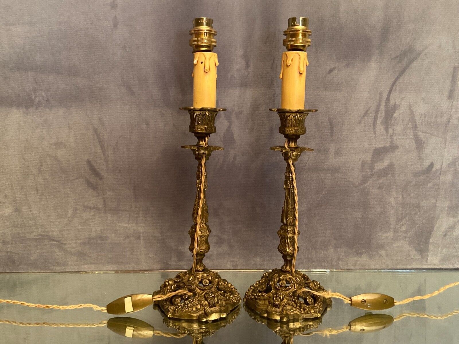 Pair of candlesticks mounted in late nineteenth century bronze lamp base Renaissance style