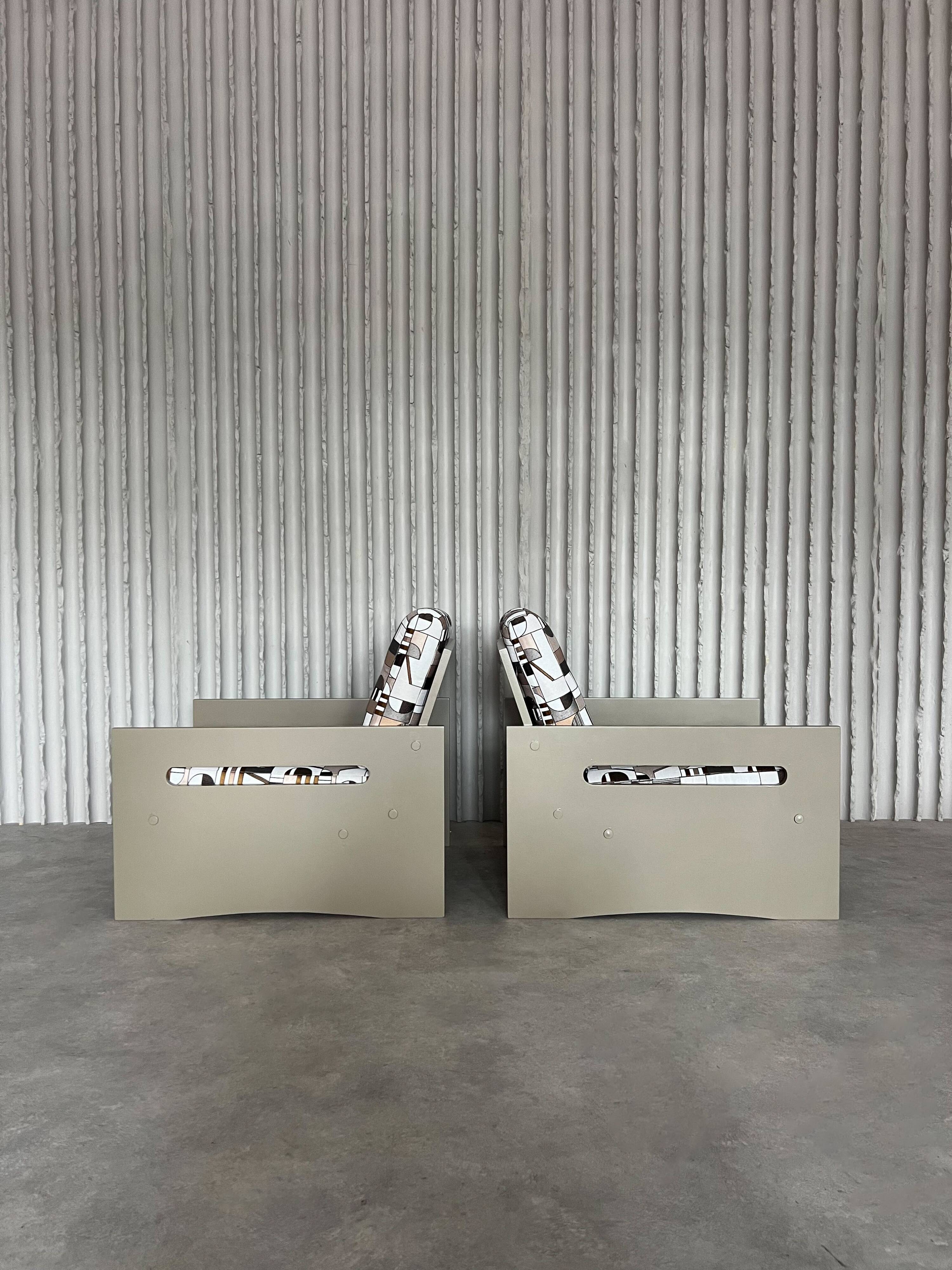 Vintage lounge chairs – newly upholstered in geometric fabric