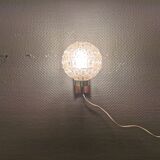 Wall light in rosewood with bobble glass ball shade.