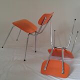 Duo of vintage chairs in orange skai