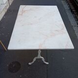 White bistro table in marble and cast iron