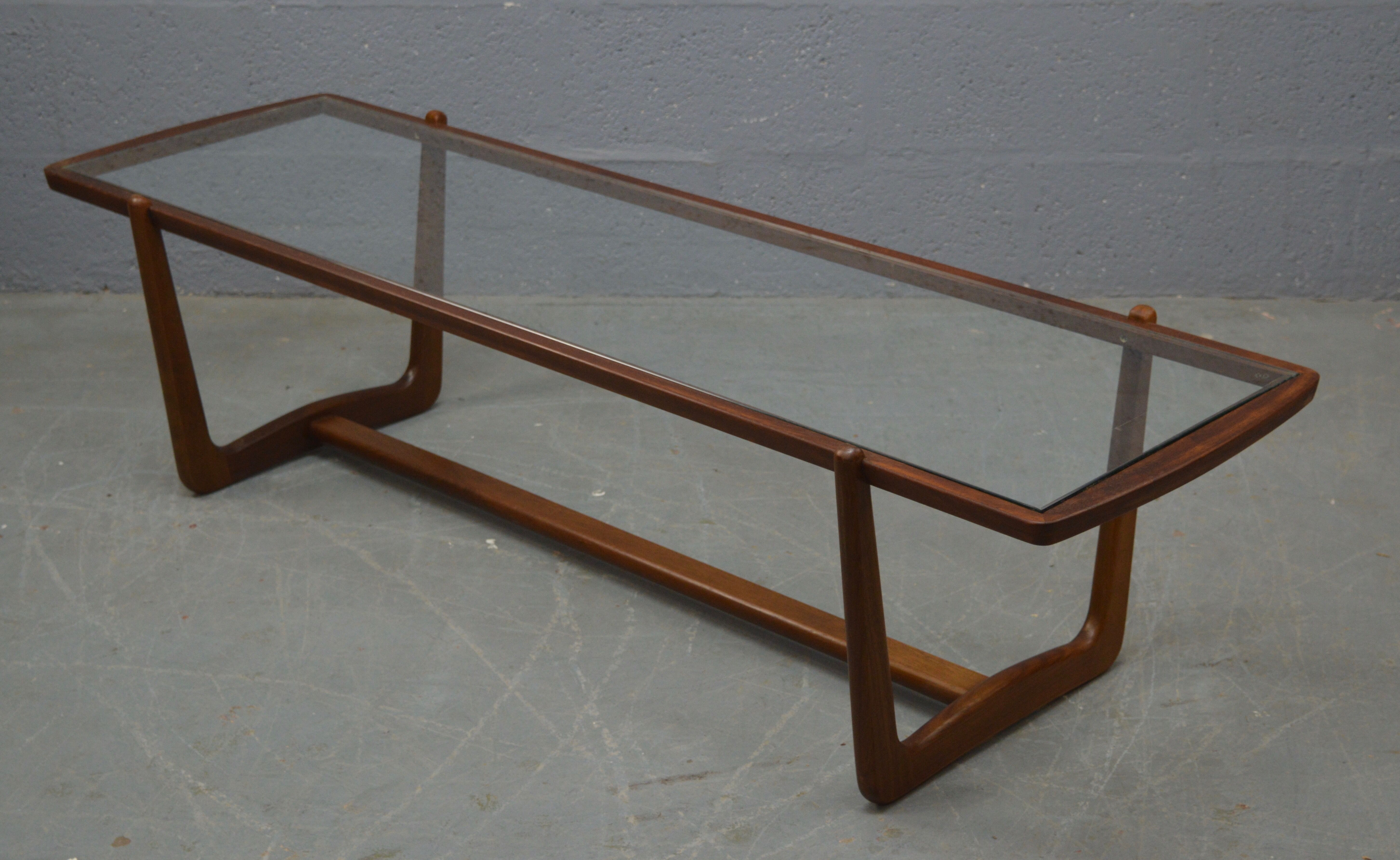 Mid century glass topped coffee table