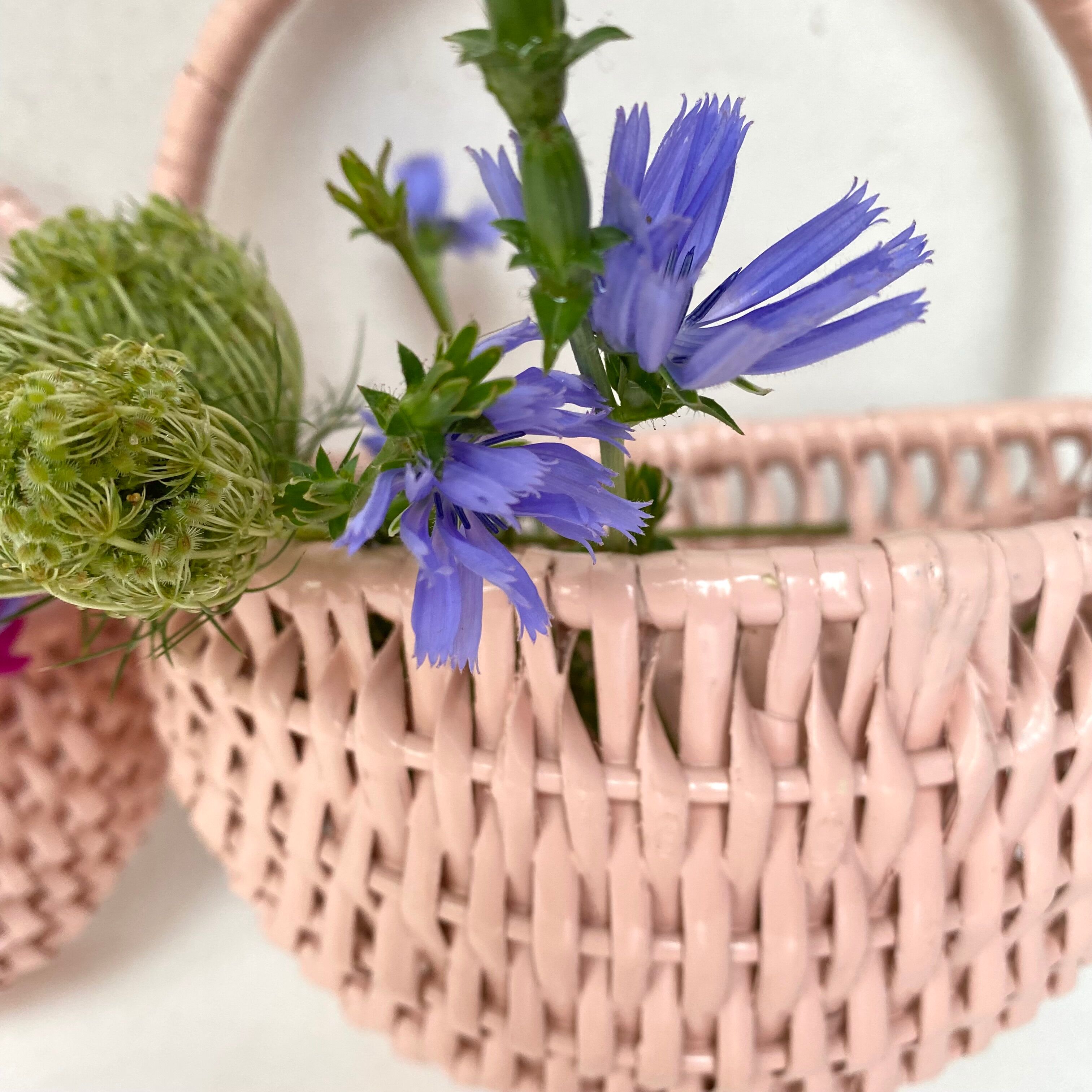 Vintage wall pans in woven wicker