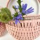 Vintage wall pans in woven wicker