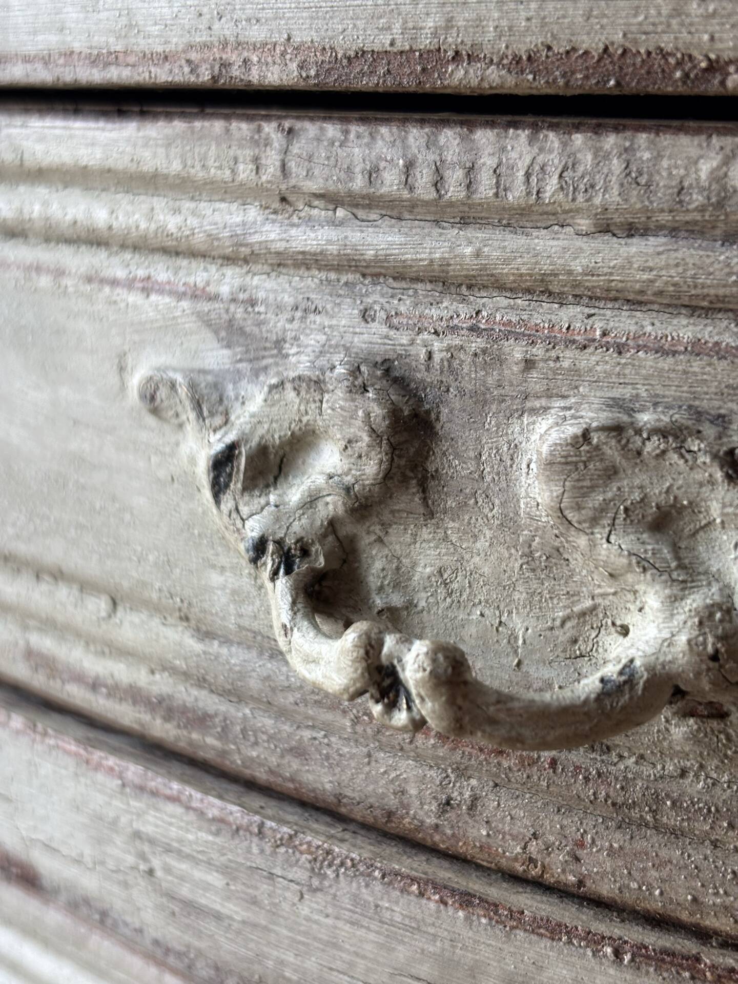 A pair of distressed bedside tables.