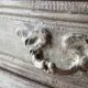A pair of distressed bedside tables.