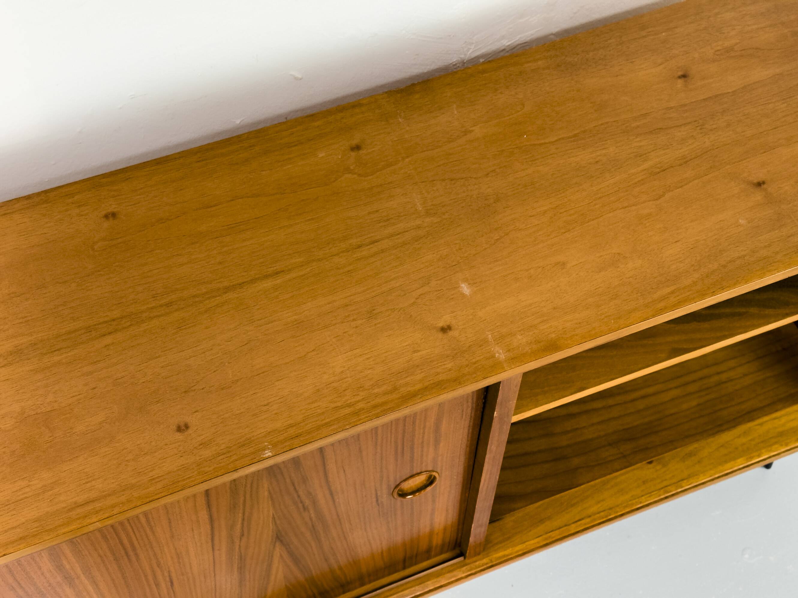 Walnut sideboard with sliding doors by Franzmeyer, 1959
