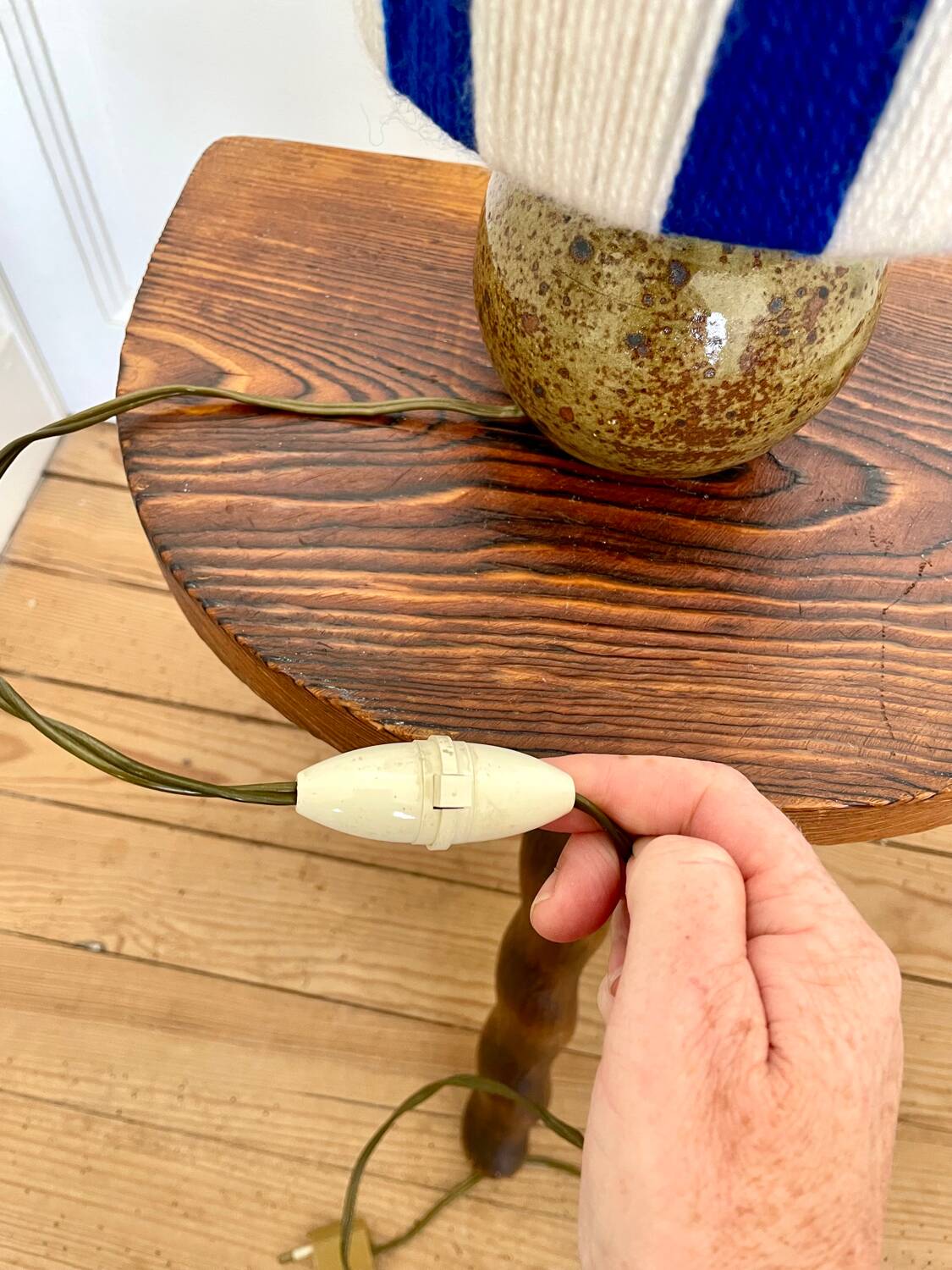 Vintage table lamp with pyrite sandstone base and striped wool lampshade