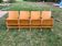 Vintage cinema bench for four people, brown varnished beech in Mid-Century style from the 1950s.