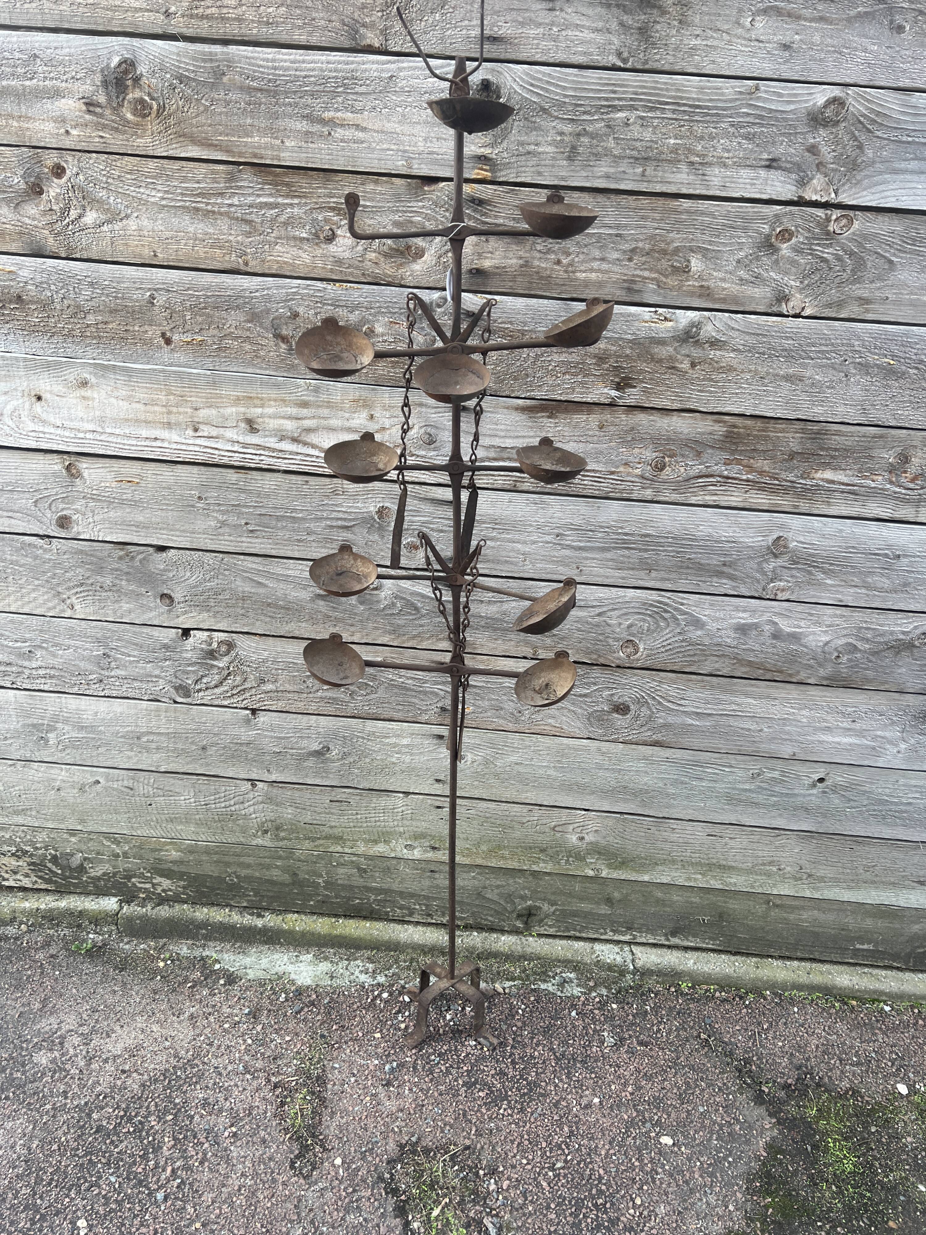 African oil lamps on stands