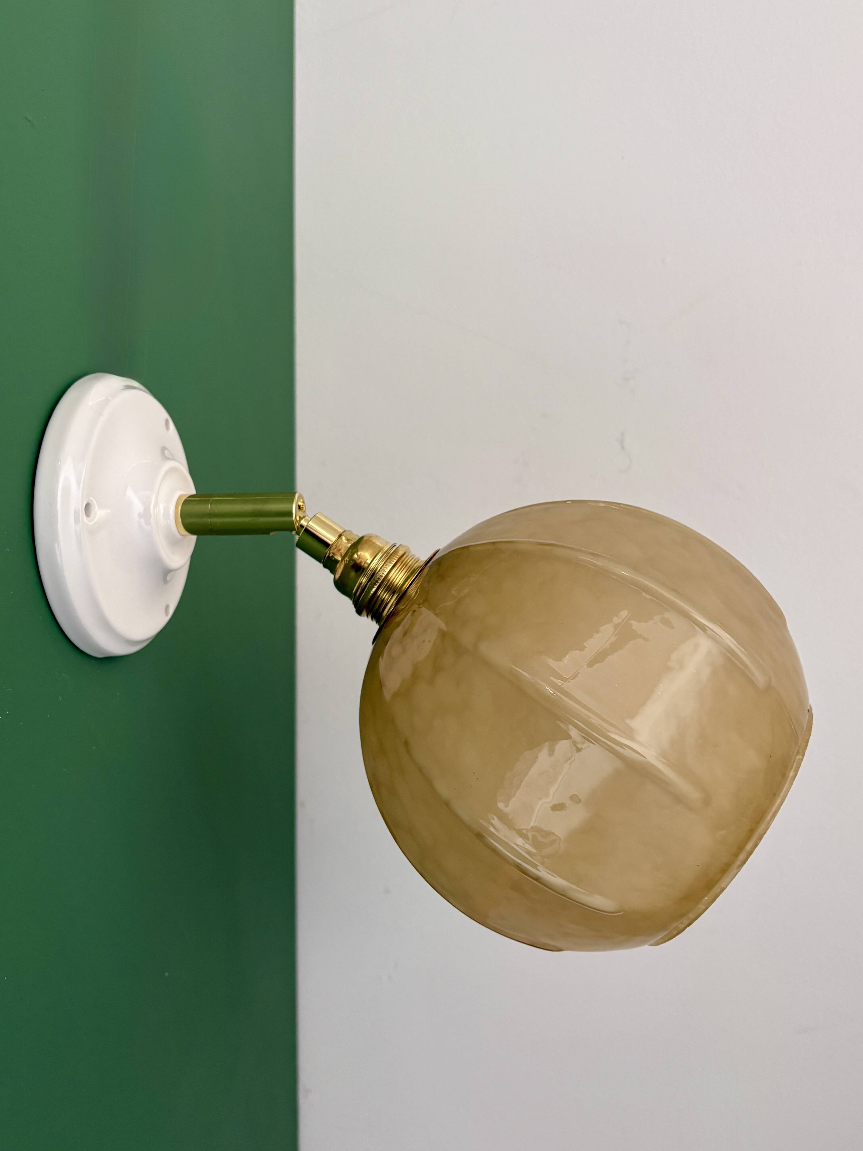 Vintage yellow glass globe wall light