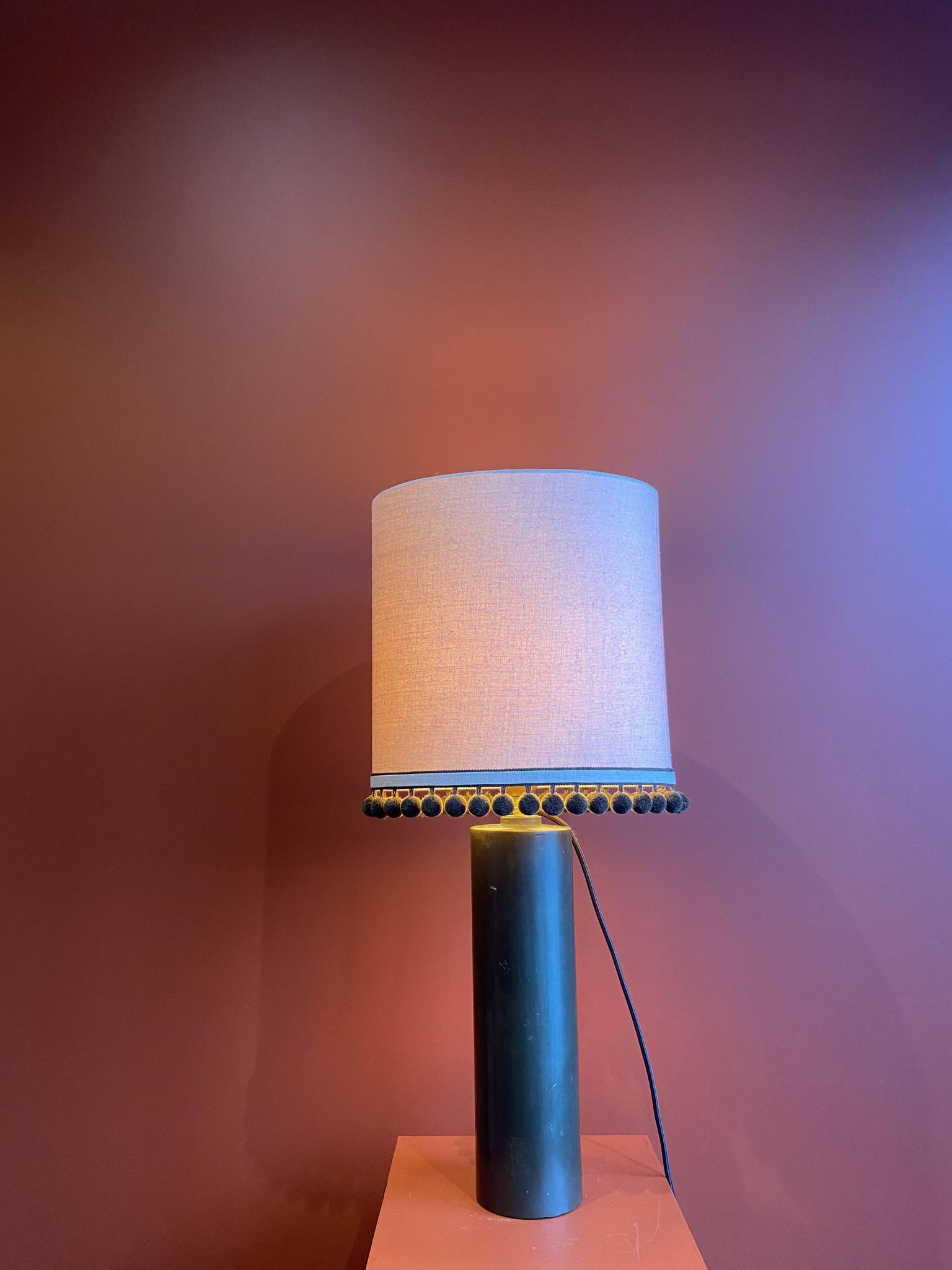 Copper "bouillotte" lamp with Ashoka Silk shade, pom-poms of c