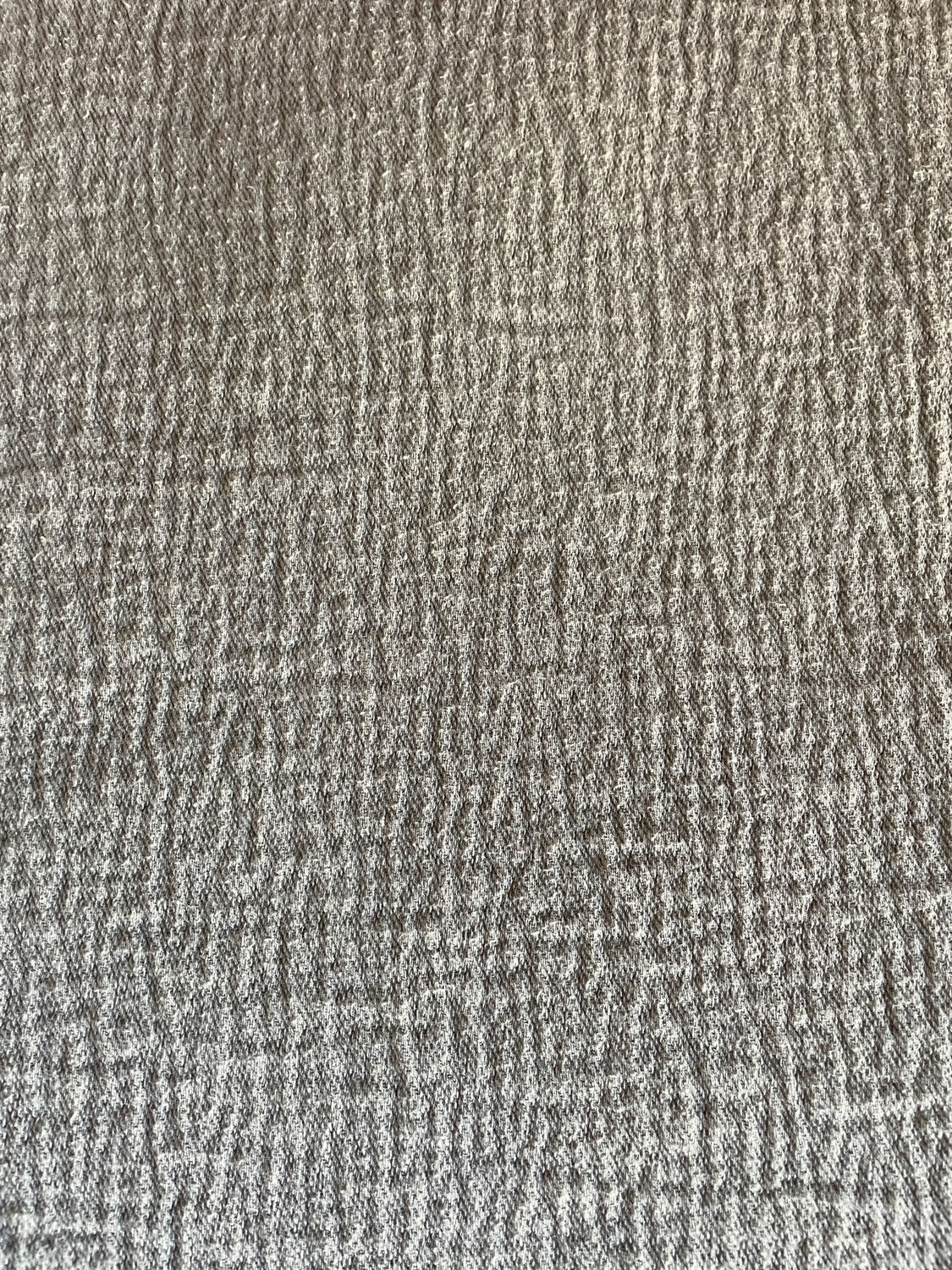 Almond-colored Caravan bedspread