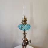 Large kerosene lamp mounted on bronze statue. Late nineteenth century