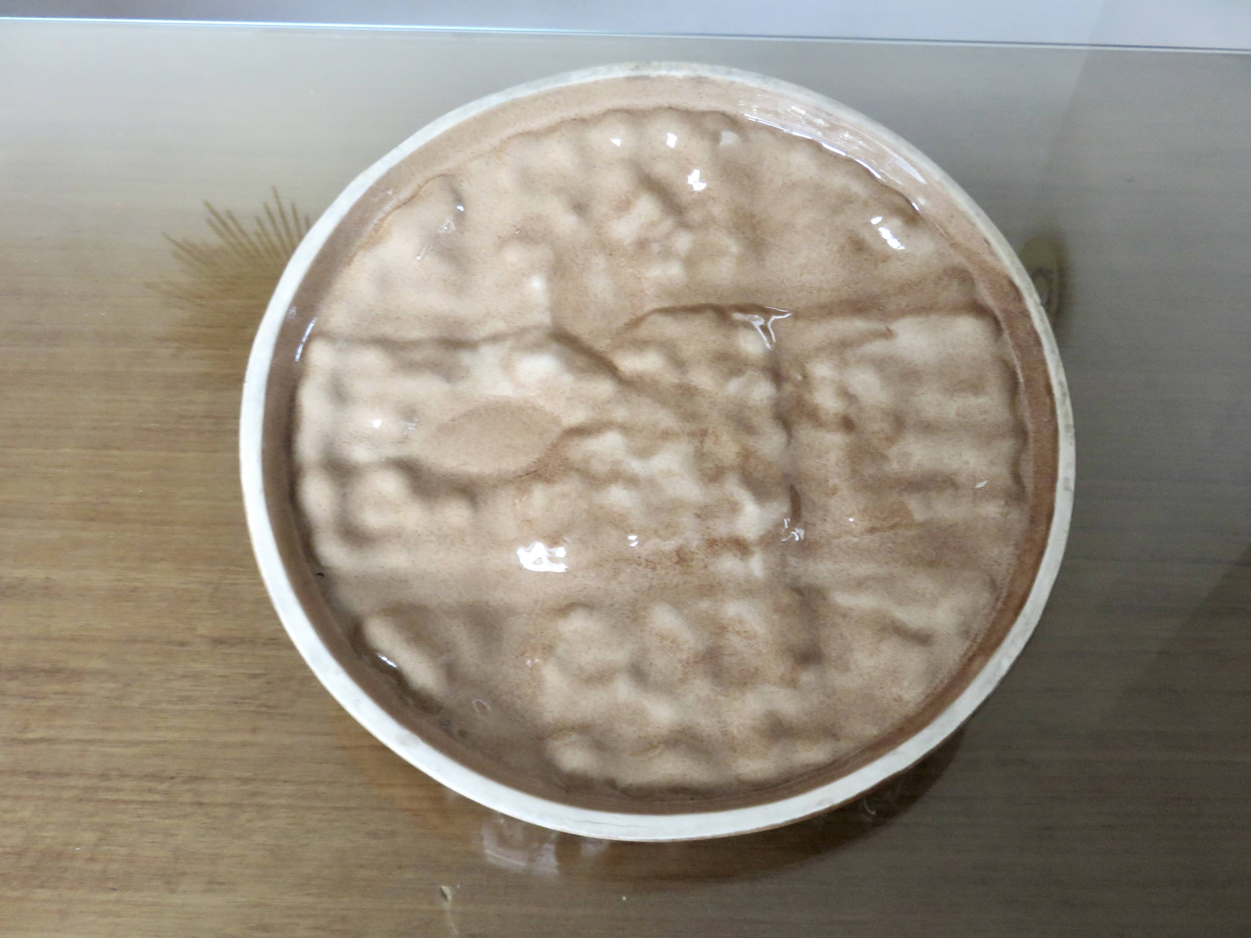 Large earthenware dish, slipware finish, Sarreguemines, France.