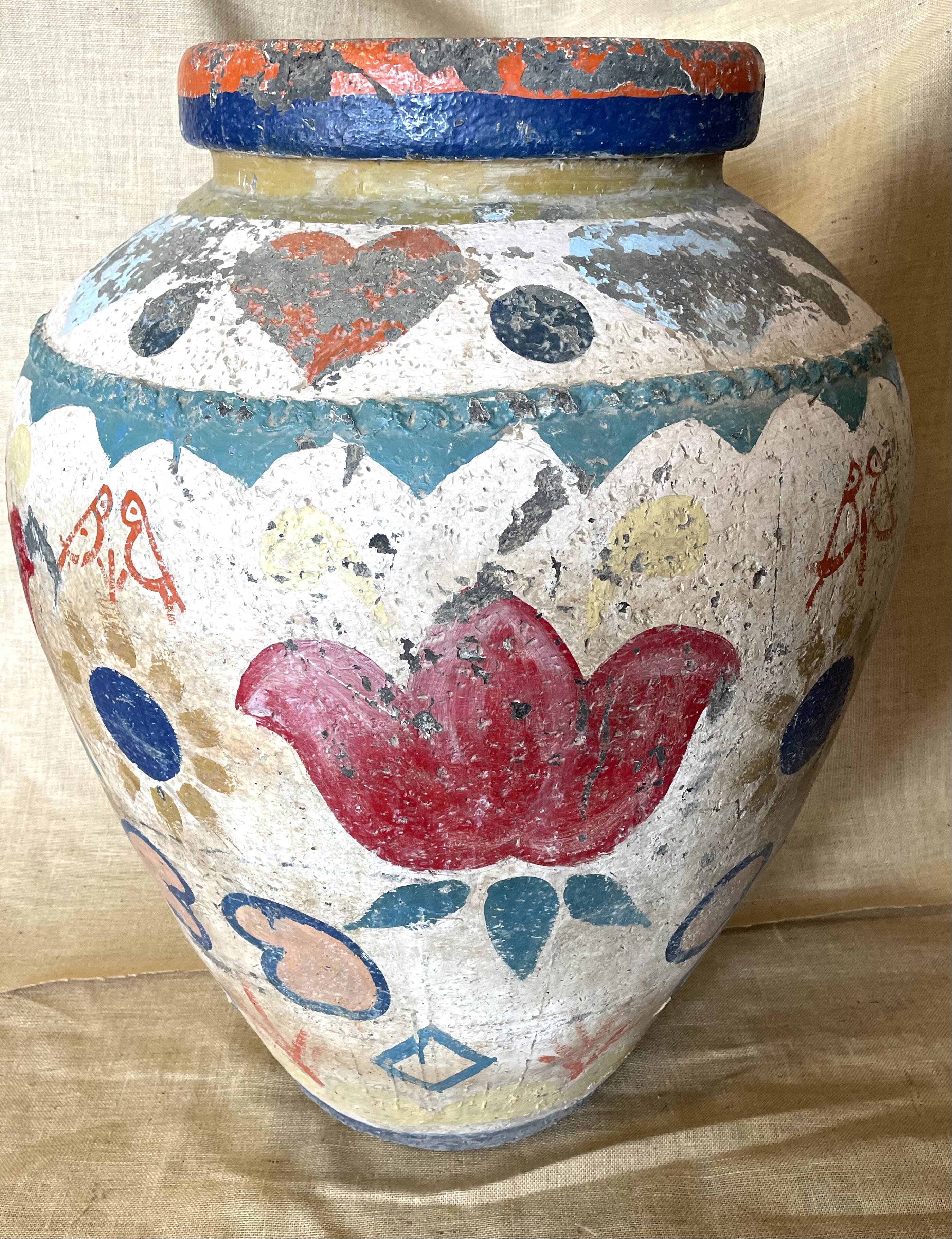 Polychrome decorated terracotta jar