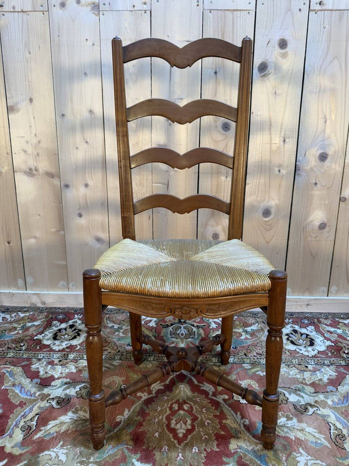 Set of 8 rustic high-back straw chairs.