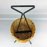 Black metal rattan trash can on 1960