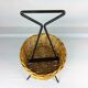 Black metal rattan trash can on 1960