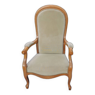 Voltaire style armchair with seat and back in almond green velvet