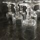 11 glasses and 1 wine carafe
