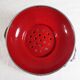 Colander on foot in red enamelled metal