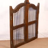 Old Burmese teak gate with openwork wrought iron panels