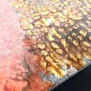 Coffee table by Robert and Jean Cloutier in enamelled lava and metal, 1950s.