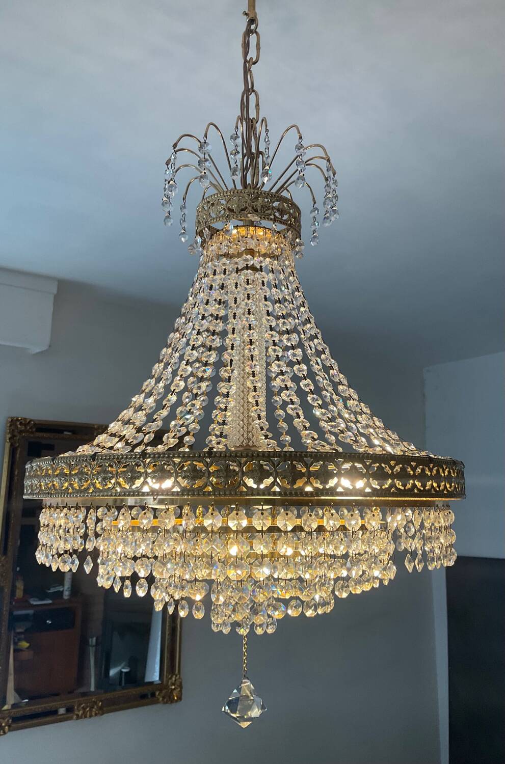 Brass hot air balloon chandelier with cascade of tassels