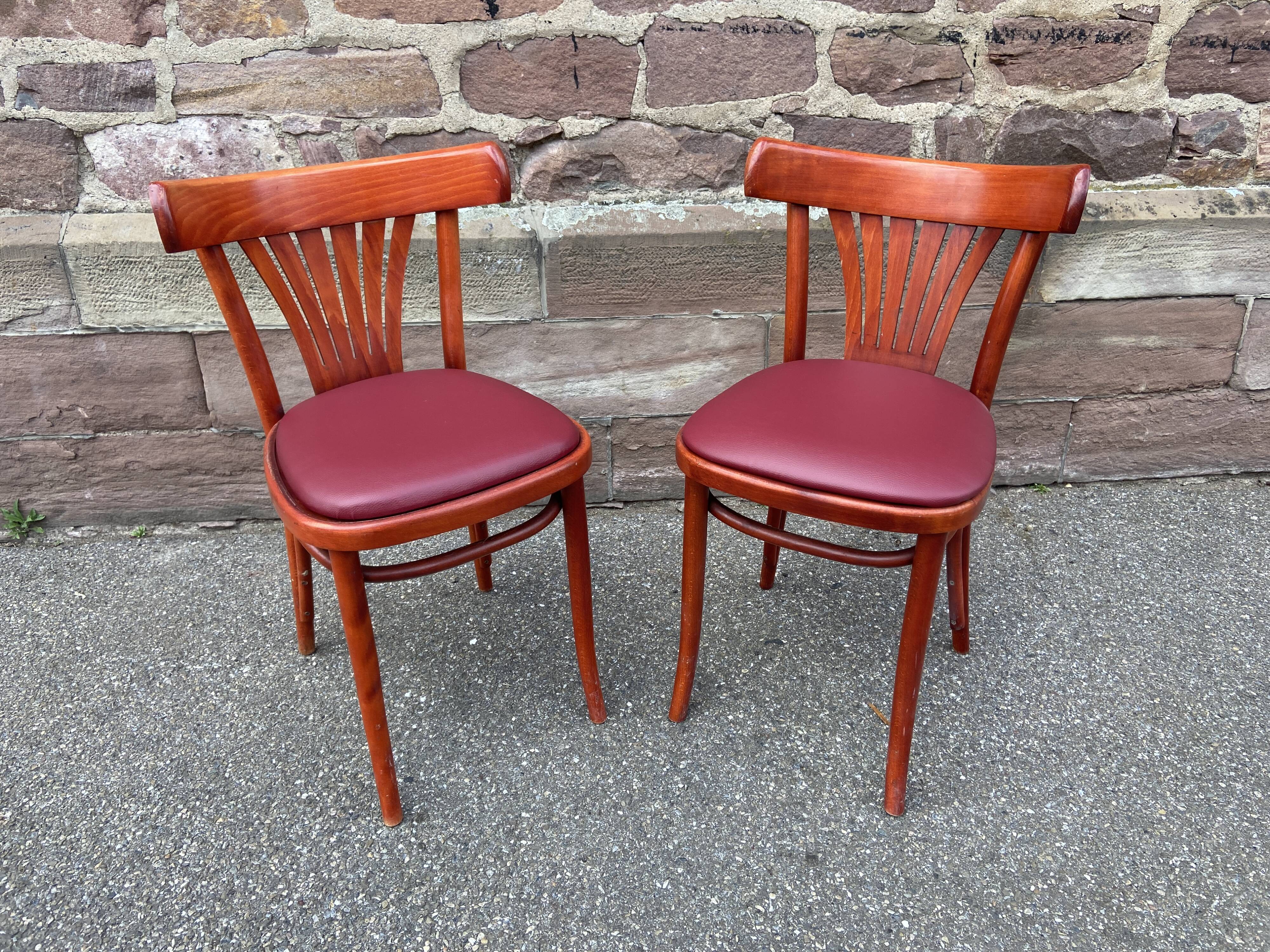 Pair of Alsatian bistro chairs in wood and leather, 1960