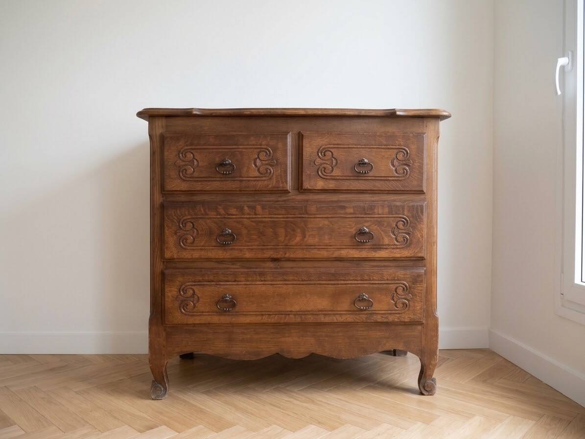 Set of chest of drawers and tall antique furniture in dark oak.