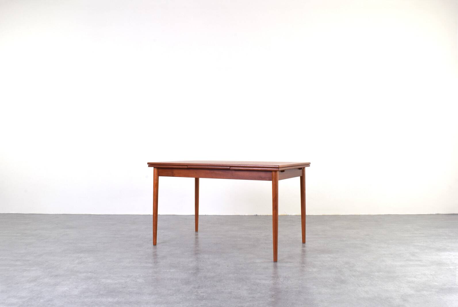 Mid-century Danish teak extendable dining table, 1960s.