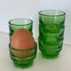 6 egg cups, green glass digestif glasses Lever.