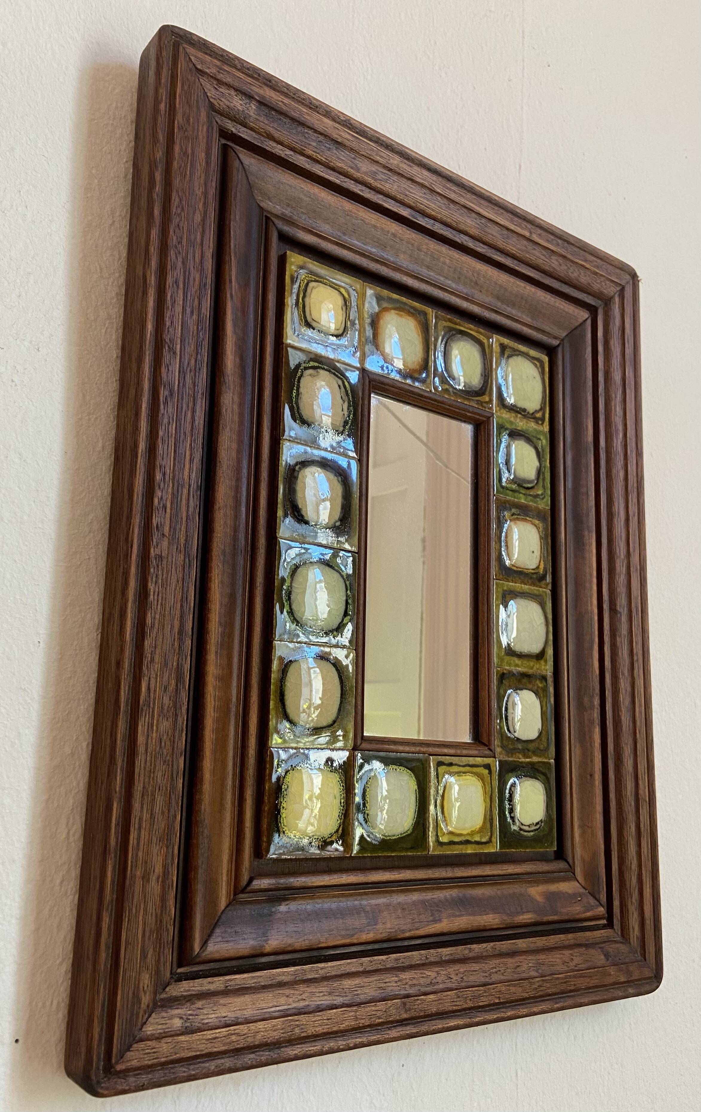 Ceramic and wood mirror from the 80s.