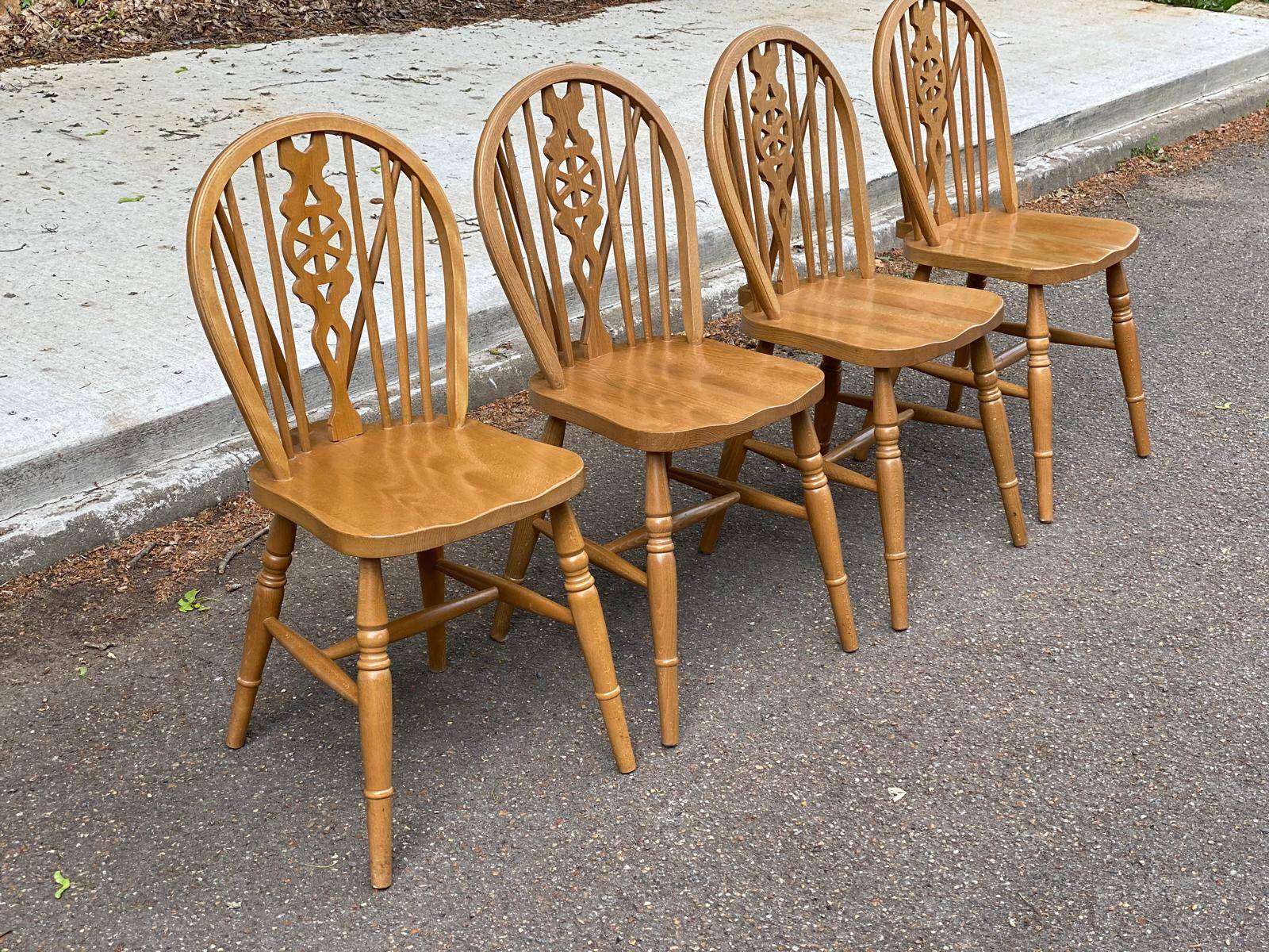 4 Windsor Wheelback English chairs in solid curved wood interior's