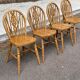 4 Windsor Wheelback English chairs in solid curved wood interior's