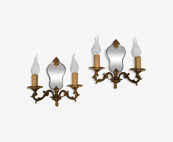 Paire d'appliques à fond de miroir double feux en bronze style Régence début XX
