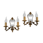 Paire d'appliques à fond de miroir double feux en bronze style Régence début XX