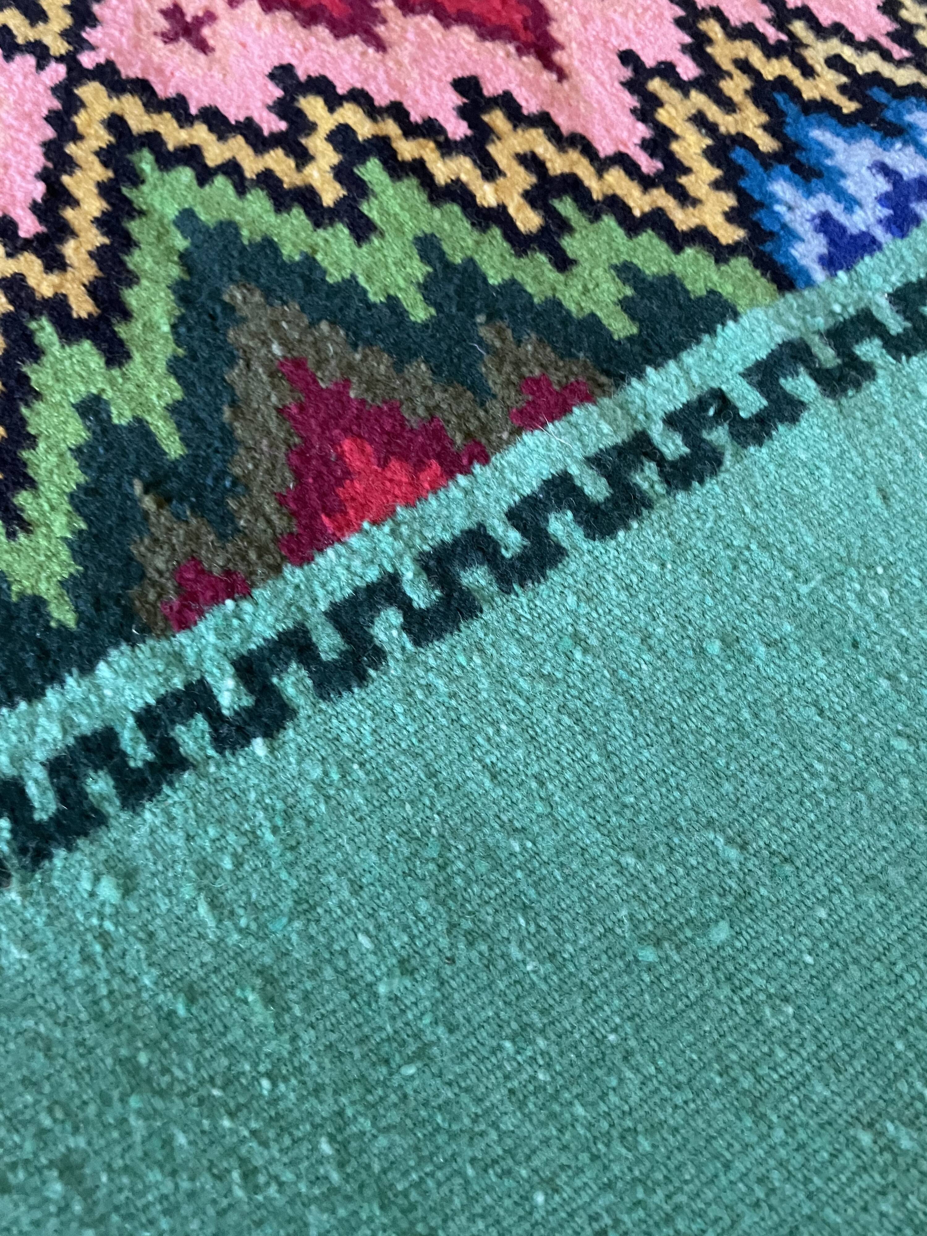 Romanian flatwoven rug geometrical design on a green turquoise background, 158x185 cm