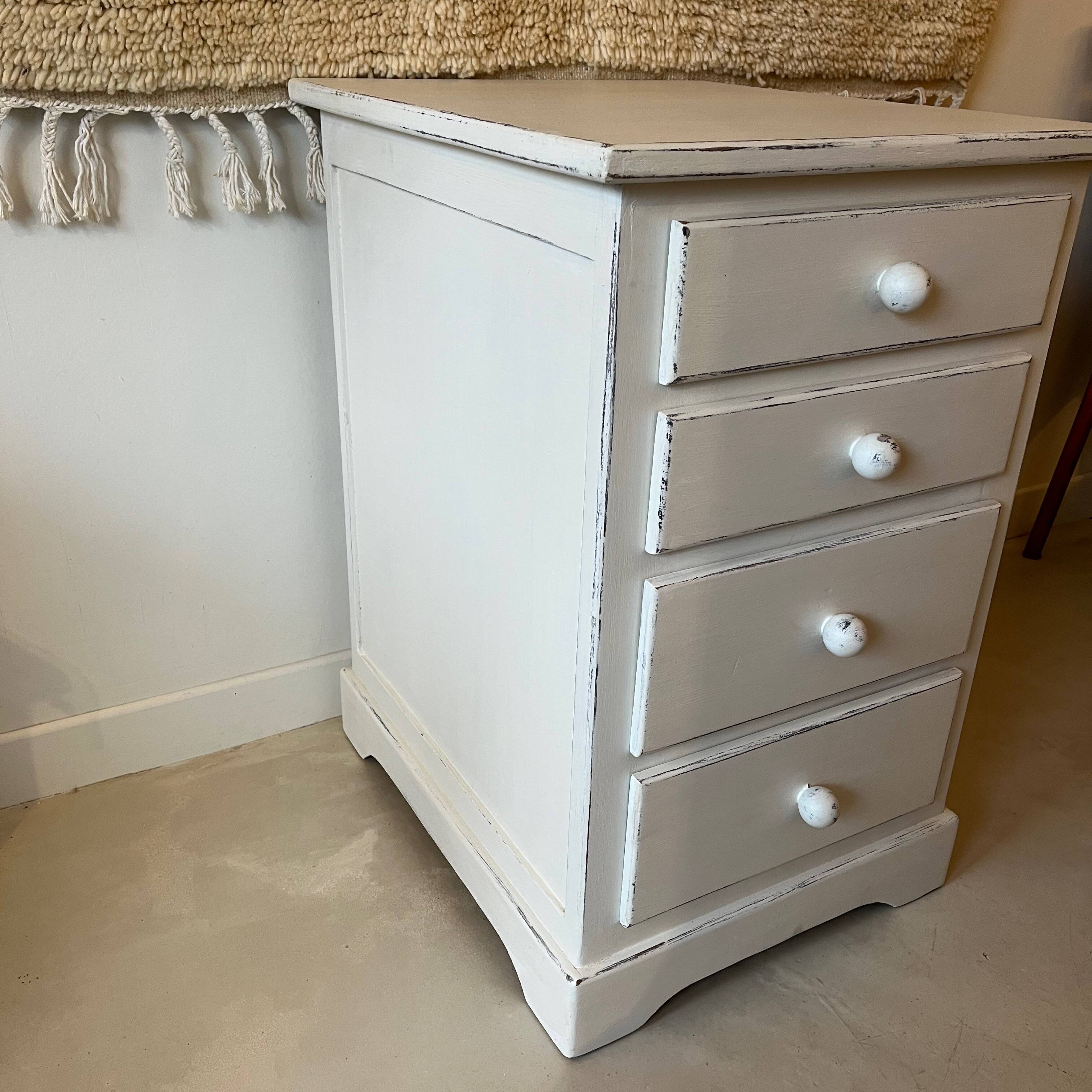 White patinated chest of drawers