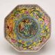 Vintage porcelain bowl decorated with dragons and flowers, China, 1980s.