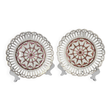 Pair of openwork porcelain plates decorated with roses
