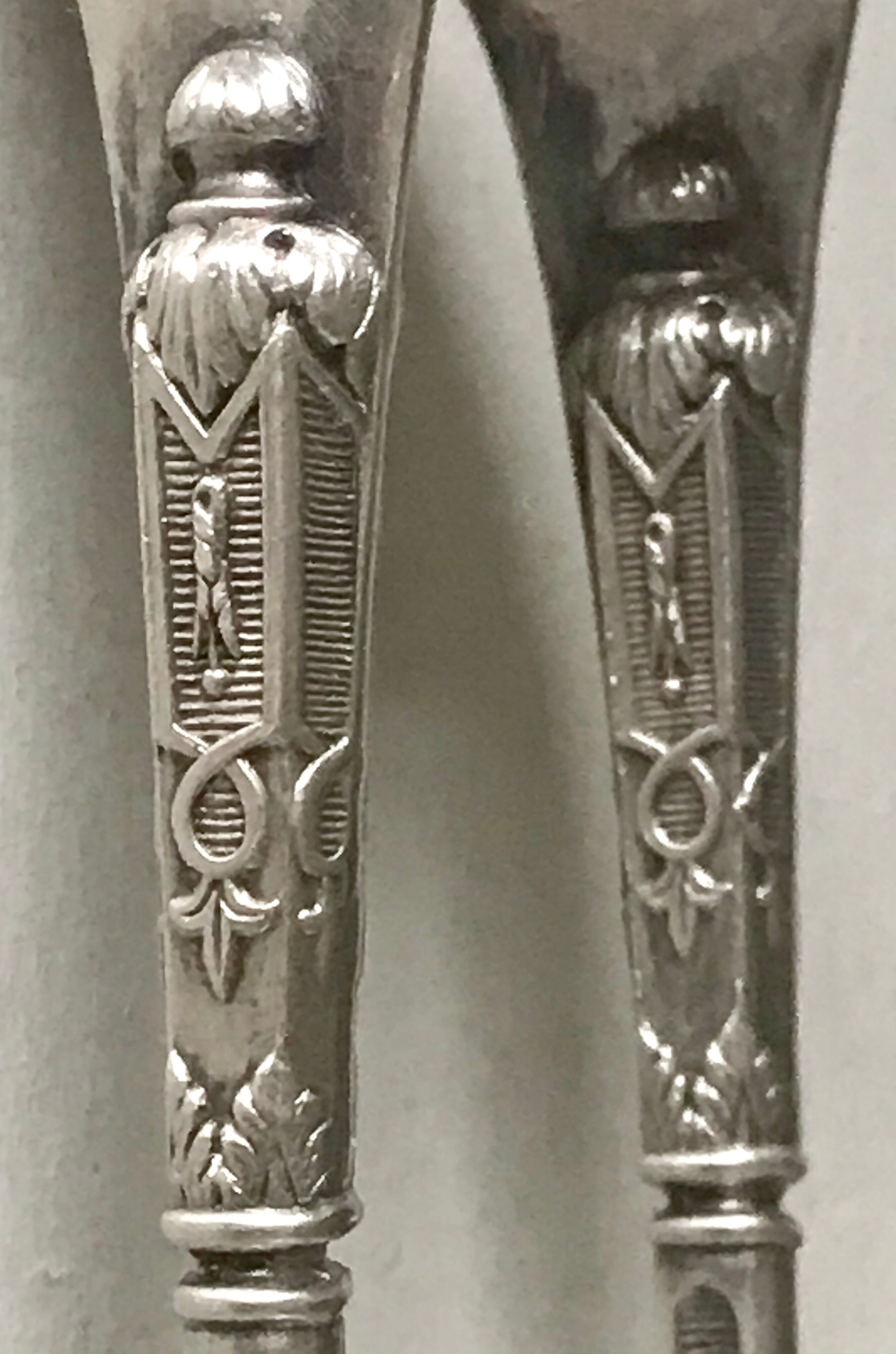 12 teaspoons silver metal