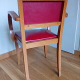 Wooden bridge chair and red skai