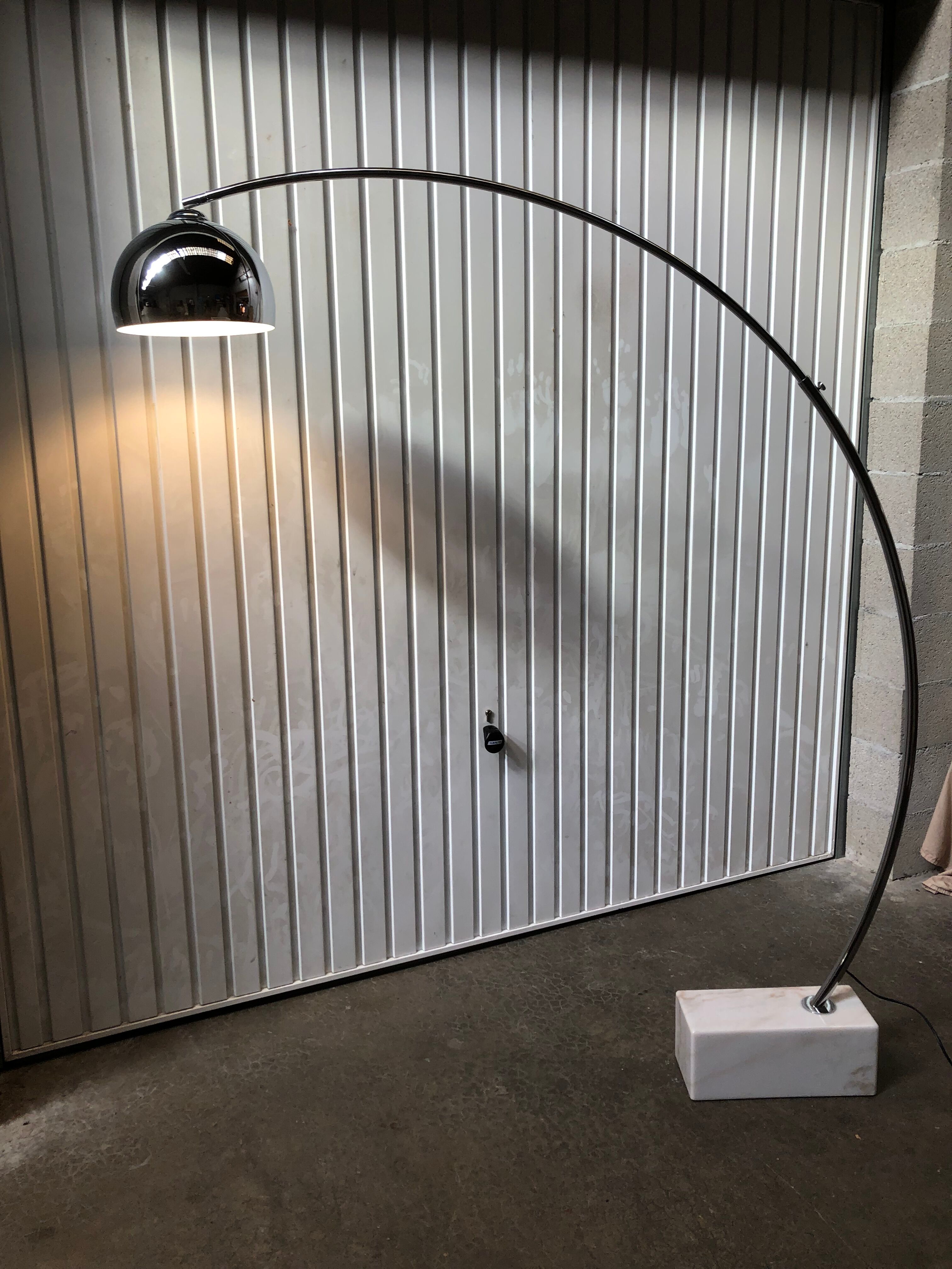Arc floor lamp design of the 80s