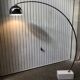 Arc floor lamp design of the 80s